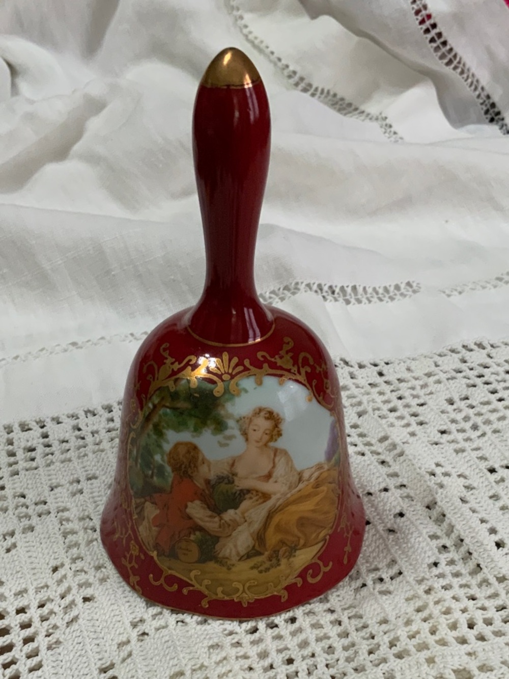 Red Floral Wreath Maker's Mark on White Ceramic
